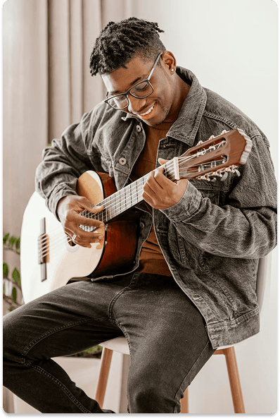 male-musician-playing-guitar